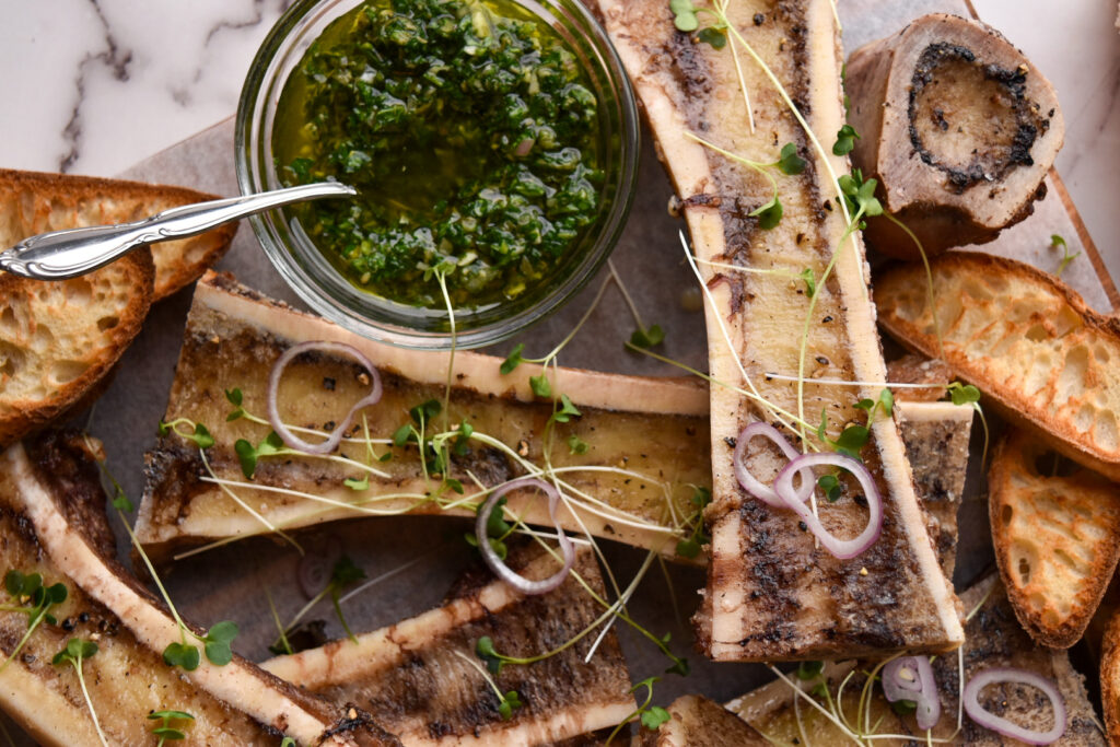 Parsley and lemon salsa verde with beef marrow bones